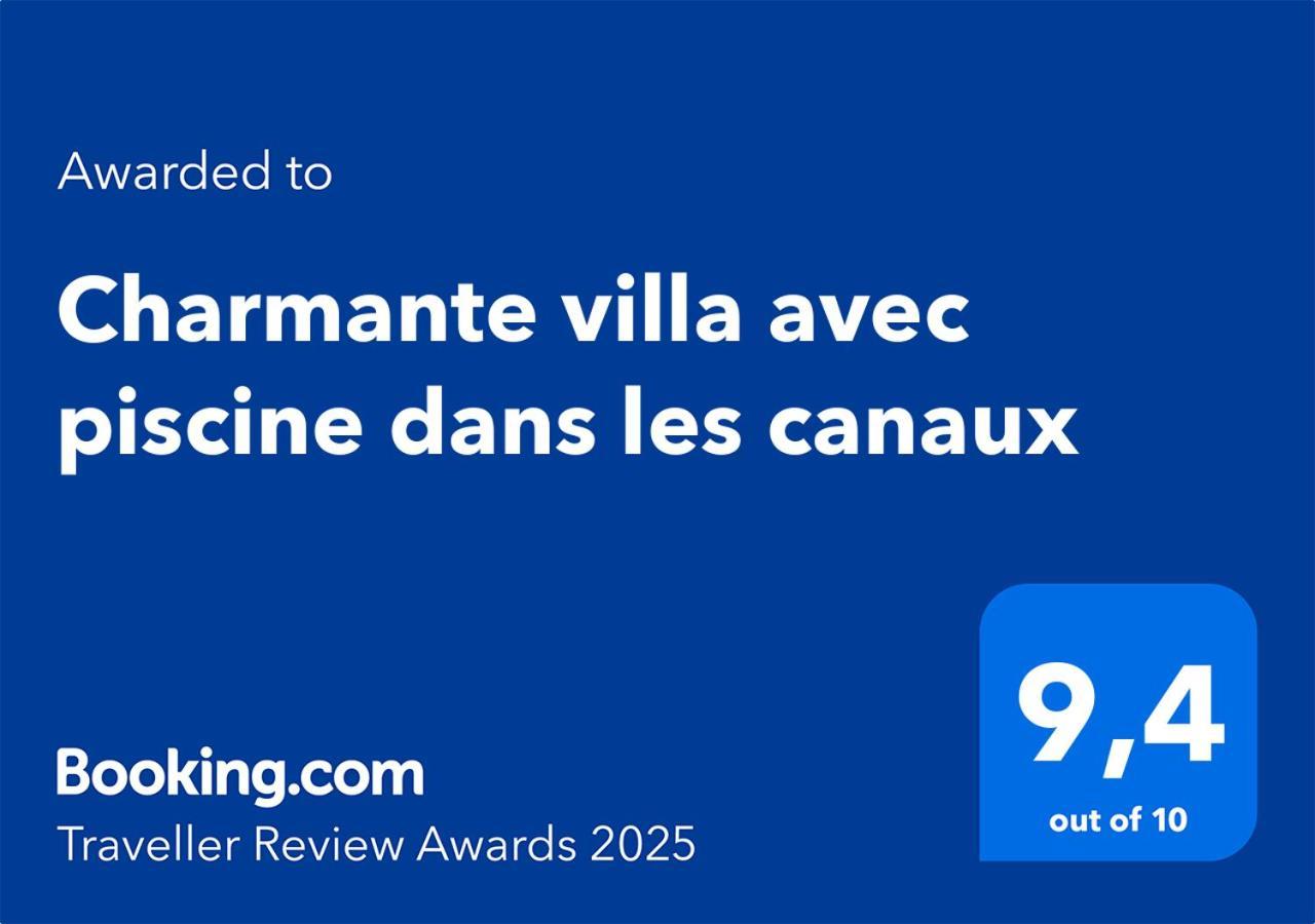 Charmante Villa Avec Piscine Dans Les Canaux เอมปูเรียบราบา ภายนอก รูปภาพ